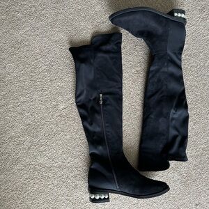 Women’s over the knee boot.